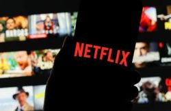 传奈飞(NFLX.US)修改与微软(MSFT.US)的协议 降低广告价格以促进增长
